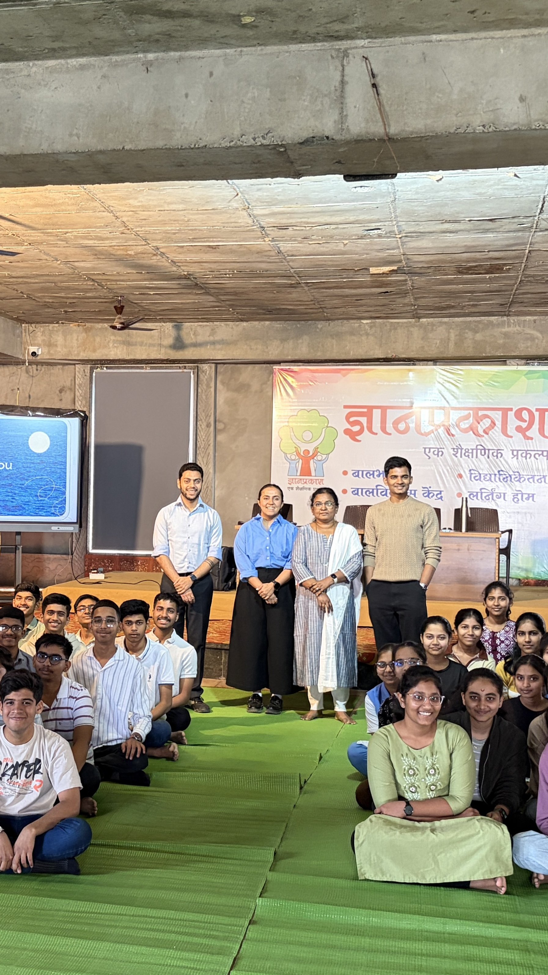 Babson College alumni Hriday Munoth, Neha Aswani, and Siddhant Narhare with Dnyanprakash students during a mentoring session