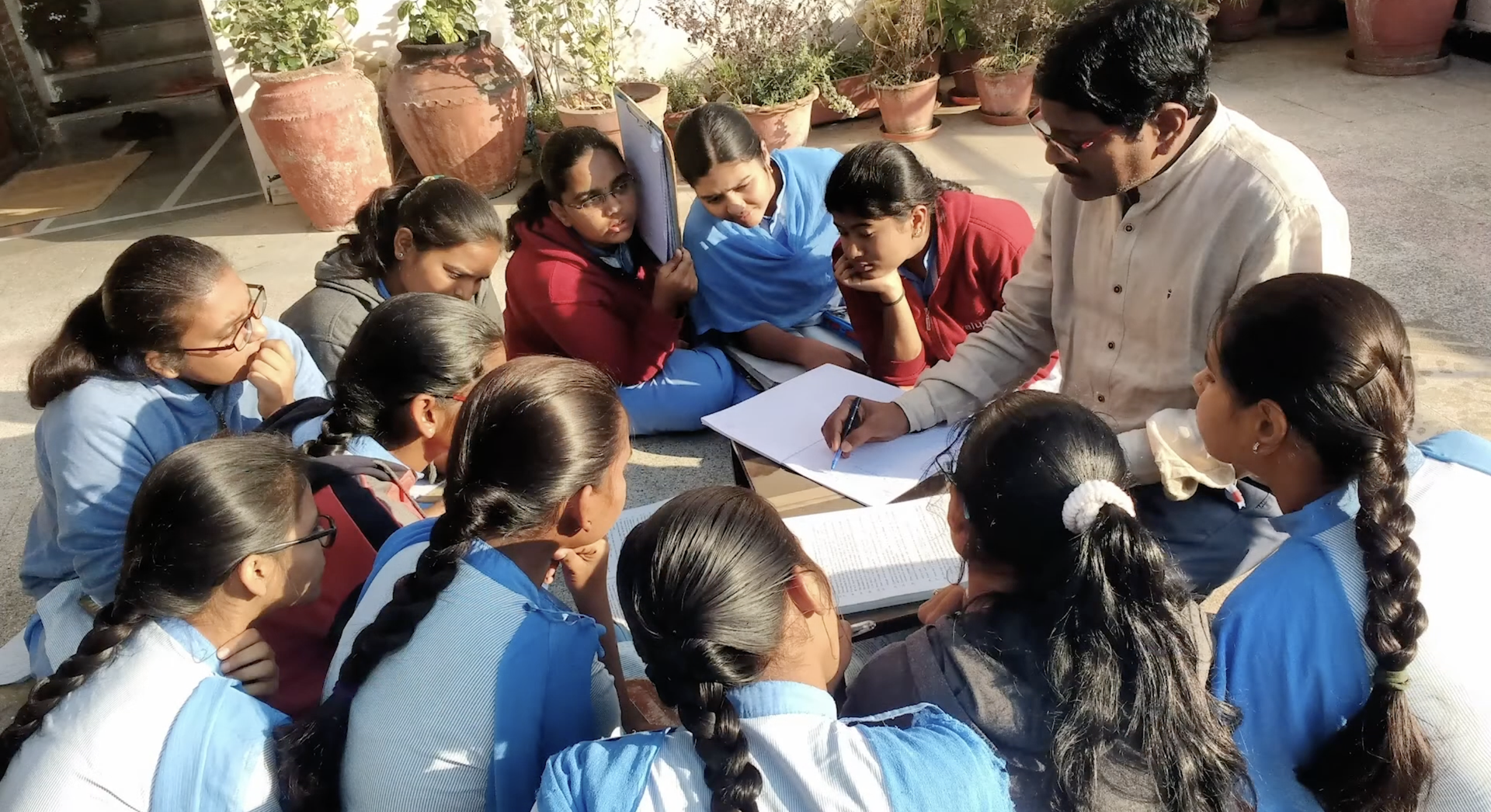 About Education hero — children learning in classroom or with family